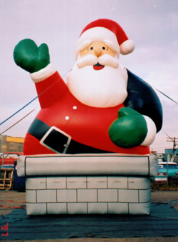 Santa Claus - Chimney Santa cold-air inflatables for sale or rent.